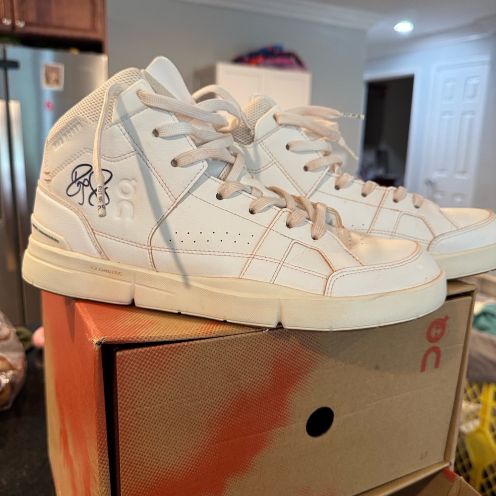 On Running Shoe Boxes in Brown and Red